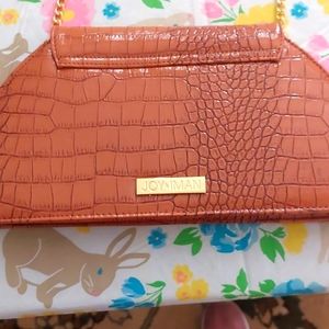 Joy and Iman purse